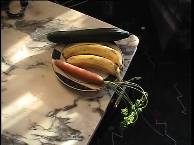 Lucky Cooch: Brunette masturbates with food and blows cock