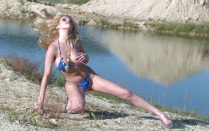 Leon Lambert: Sexy blonde shows off her hot body outdoor