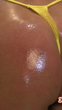 Busty bikini MILFS get oiled up together in the shower
