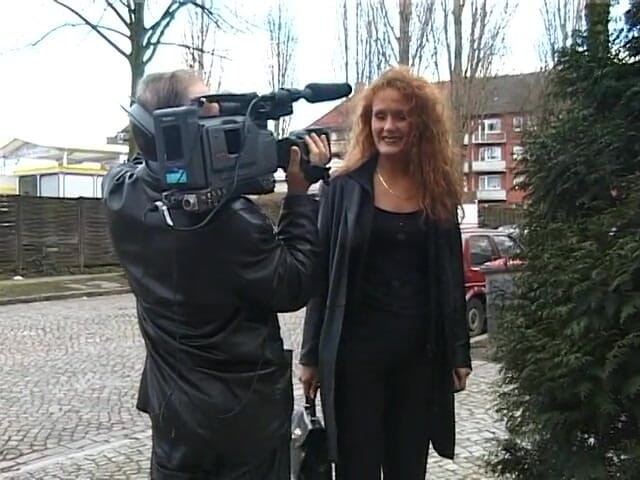 Lucky Cooch: Classy brunette interviewed on the street in vintage german video
