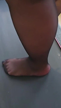 Walking on the Treadmill in Stockings and Heels