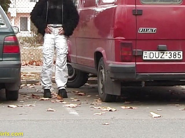 Girl peeing between the cars (Crazy pee girls)