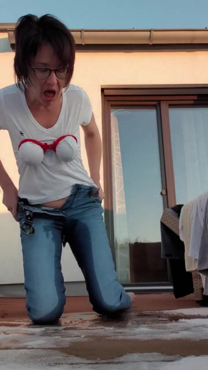 JulieEroticDress: Squirt in Jeans on Balcony