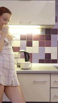 Naughty Redhead Loves Wet Play on Kitchen