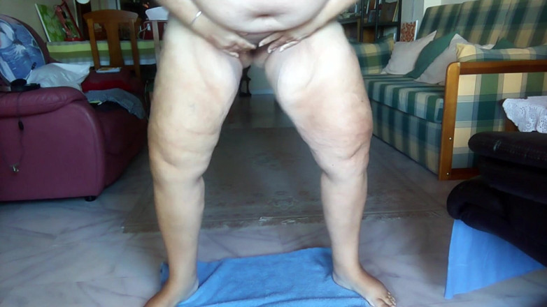 Sex hub couple: Jen is standing up and is peeing on a towel...