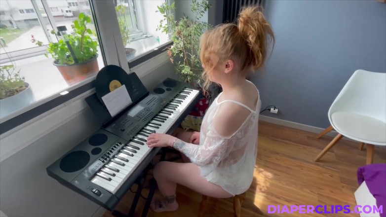Nicole White: Playing on Keyboard.