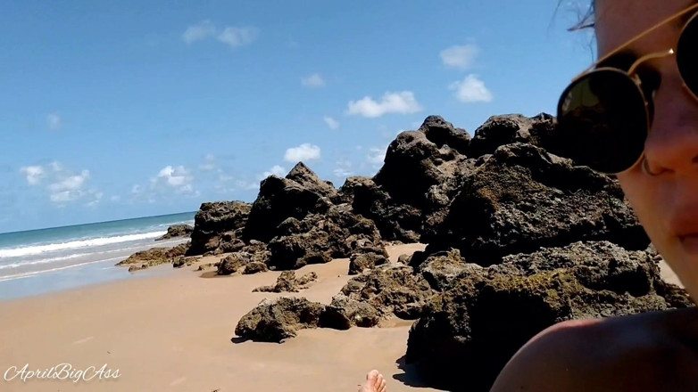 April BigAss: Risky blowjob on beach, so afraid