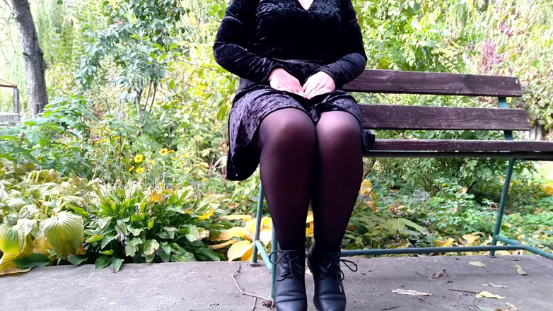 Elena: Peeing with legs spread wide on a bench in an...