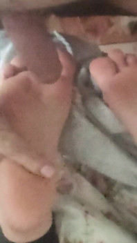 Playing with Friends Soles, While She's Reading.