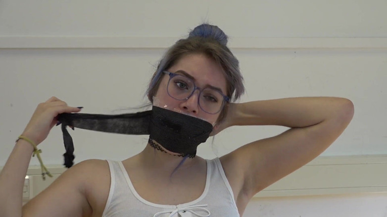 Restricting Ropes: Gagging herself with socks up close