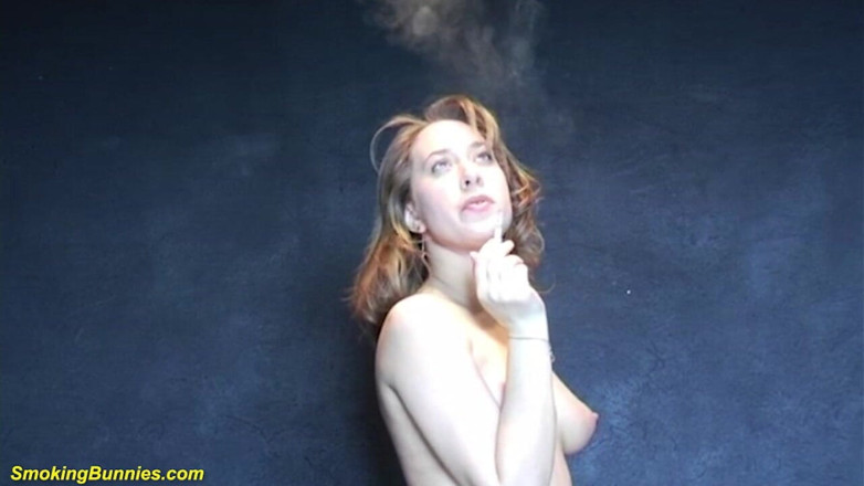 Smoking Bunnies: Busty redhead smoking and stripping