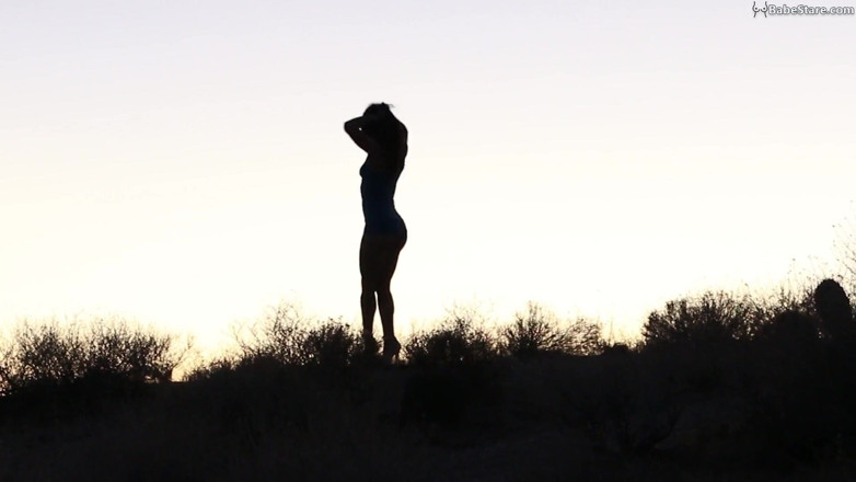 Babe Stare: Sexy Tia girl is nude but only teases in silhouette