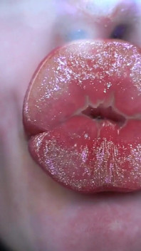 Glamour Girl Kiss with Sweet Shiny Juicy Lips