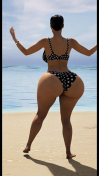 Mrs. Gunther Shaking It at the Beach