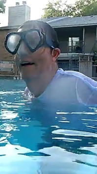 Couple Underwater Diving and Swimming
