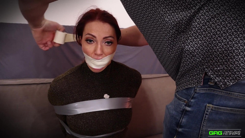 Gag Attack: Mila in tape bondage