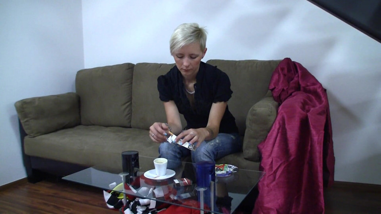 Smoke it bitch: Sweet blonde loves smoking cigarettes on the couch