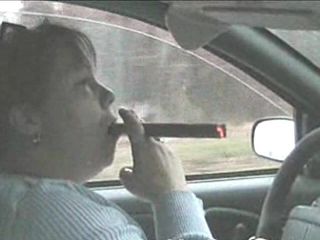 Smoking dawn: Huge cigar in the car