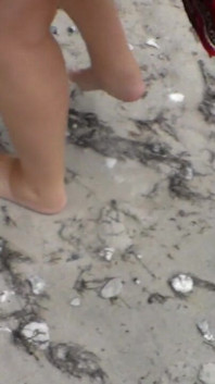 Jen Shows up Her Naked Feet in the Sand
