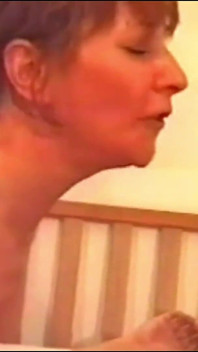 This Mature Woman Masturbates and Dreams of Being Pounded by Two Men.