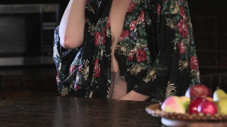 Adam & Eve: Fabulous brunette rubs her pussy in the kitchen