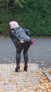 Naughty Granny Tongue Out Flashing Big Tits in Public