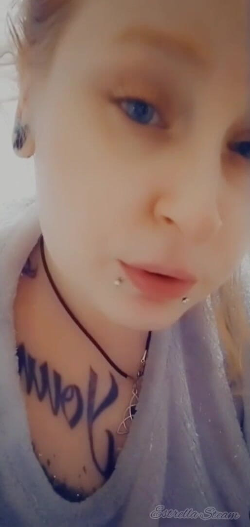 Estrella Steam: Girl with piercings smokes a cigarette
