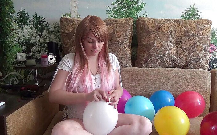 Goddess Misha Goldy: I am blowing 10 different color balloons!