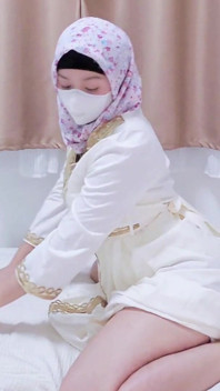 A Malaysian Hijabi Girl Teasing with White Abaya Showing off Her Ass