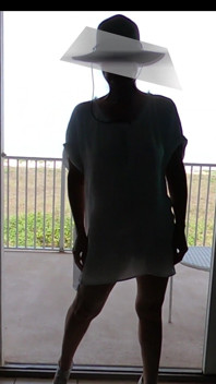 Sunning on the balcony in plain view of everyone walking by