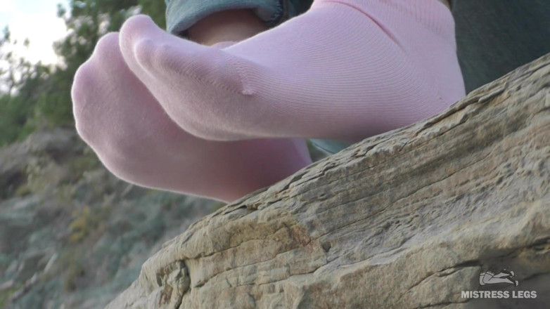 Mistress Legs: Sexy feet in pink ankle socks on the seashore