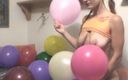 Solo Sensations: Chick strips and rubs balloons on her tits