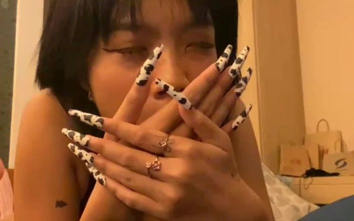 Emma Thai: Emma Thai Enjoys Long Nails for Her Holes in Live...