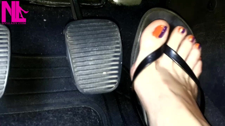 Nyllady: Revving and Pedal Pumping in Black Flip Flops