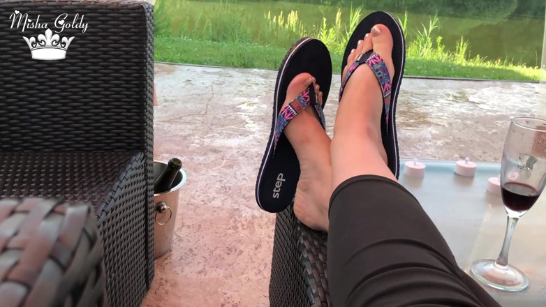 Goddess Misha Goldy: Flip flops dangling outdoor near lake with silver nails &amp; toes...
