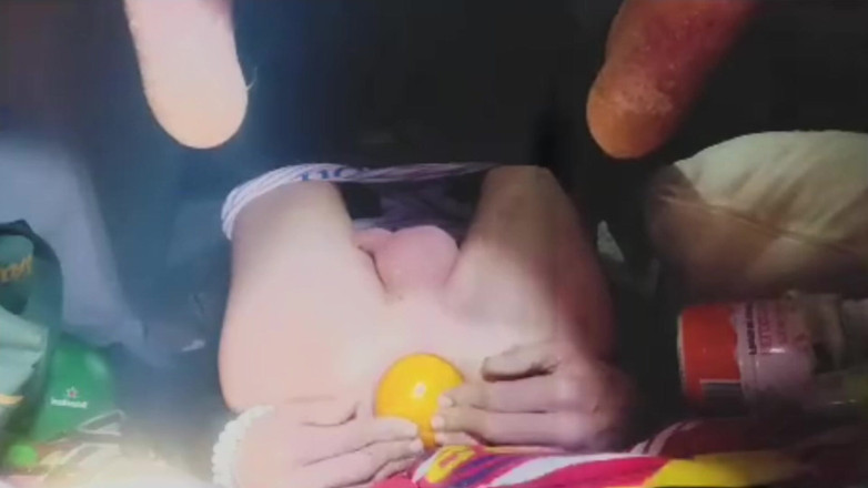 Culopeke: A Young Man Stuffs a Crystal Ball and an Orange...
