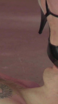Redhead mistress rides on his face