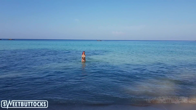 SweetButtocks: Great babe nude resting on the beach and swimming in...