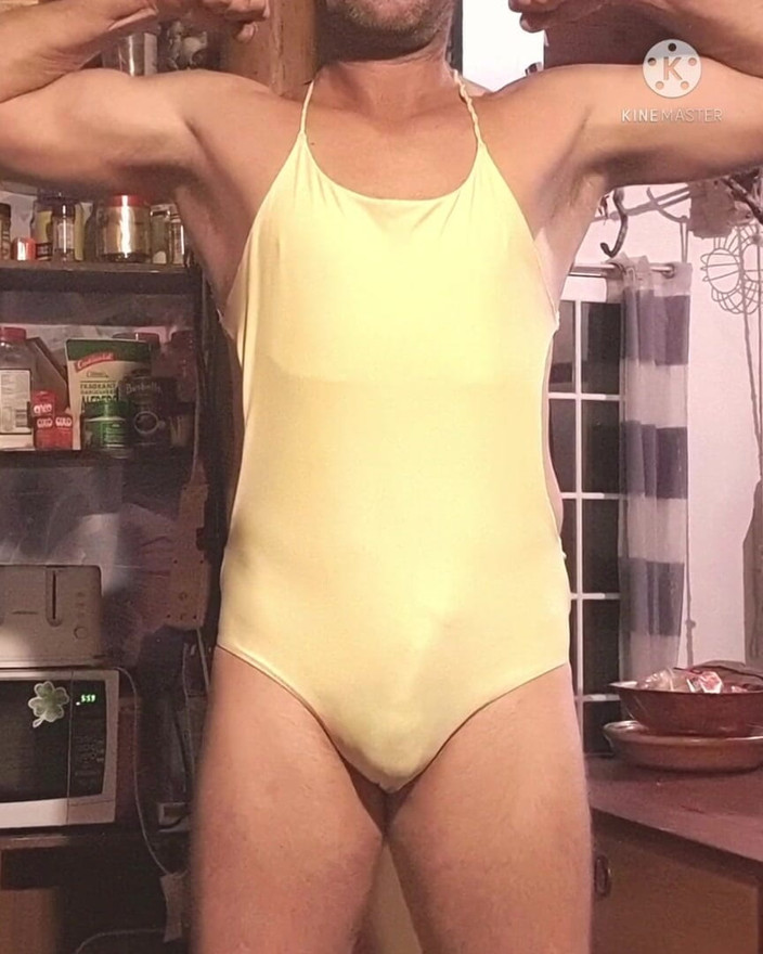 Madaussiehere: Yellow one-piece swimsuit shower