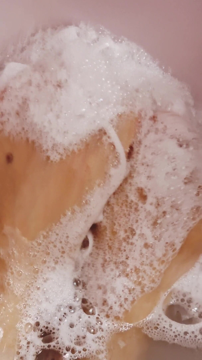 Daphnee Lecerf: Rubbing my feet on a bath flower