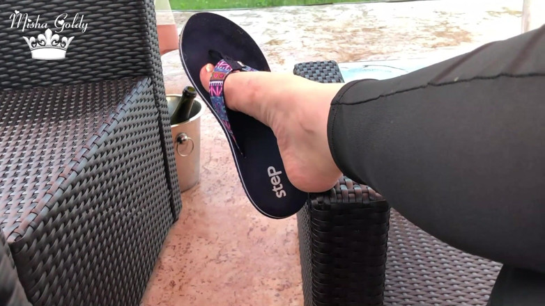 Goddess Misha Goldy: Flip flops dangling outdoor near lake with silver nails &amp; toes...