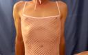 Sexy Sandy porn: Sexy Sandy Strokes Her Cock in Pink Mesh