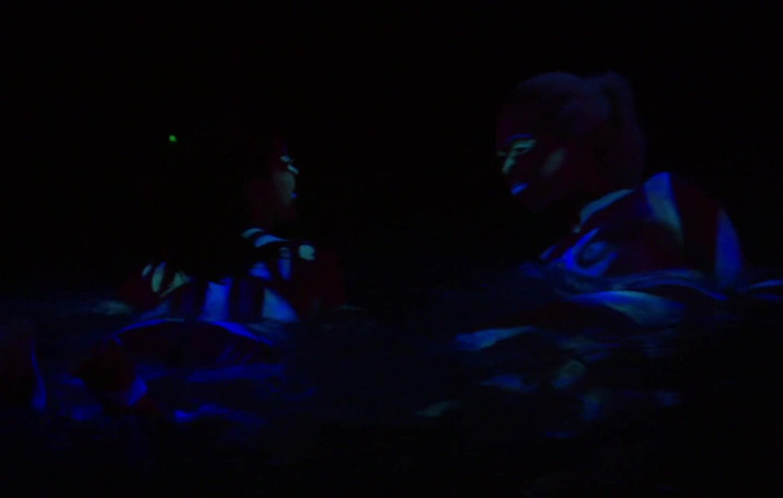Radical Lesbian: fluorescent body paint girls.