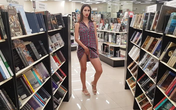 Sweet Buttocks: Woman in a Bookstore Shows Her Pussy and Ass