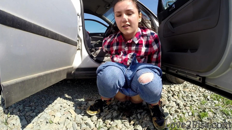 Love 2 Piss: She is almost caught peeing in front of a car