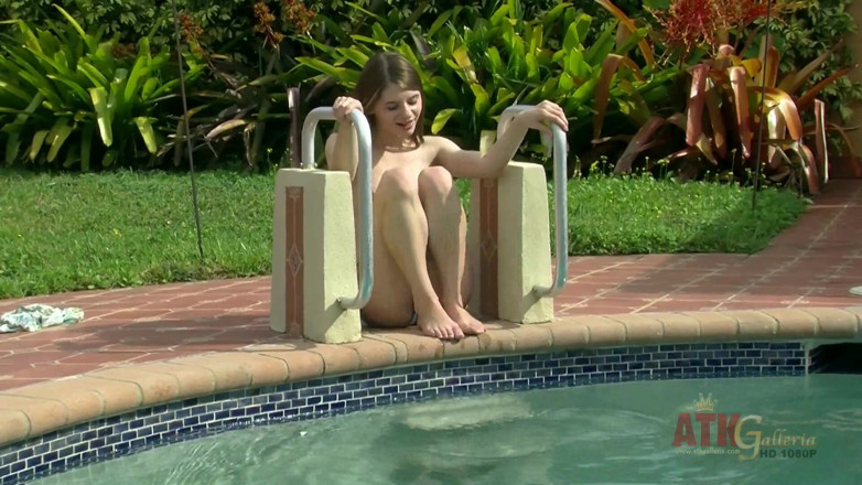 ATKIngdom Fans: Skinny teen masturbates by the pool