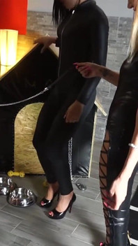 Femdom Leather Queens Dominate Naked Slave in Heels