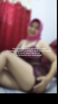 Woman Wearing a Hijab Who Is Naked