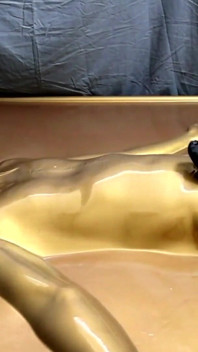 Latex Lovers Encased in Gold