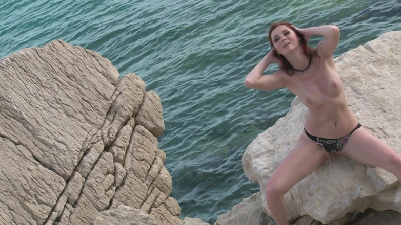 Cryptostudios: Hot brunette babe was posing naked on the rocks by...